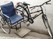 rolstoel met fiets