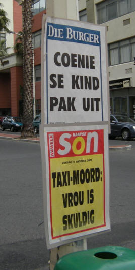 krantenkoppen op lantaarnpalen...