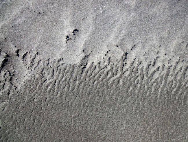 golfjes zand...