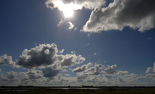 zon en wolken