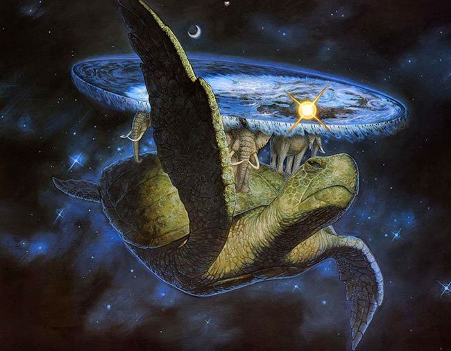 De door Pratchett verzonnen Discworld, oftewel Schijfwereld, die rust op vier olifanten die weer rusten op een enorme schildpad die rustig door het heelal zwemt.