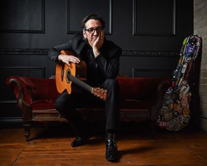 Stephen Fearing (guitar, couch, photo by Jen Squires)